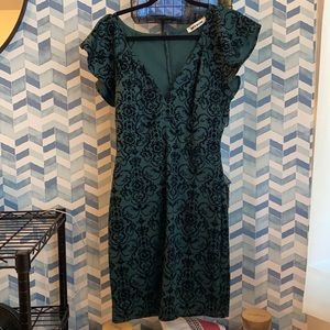 Green velvet cocktail dress